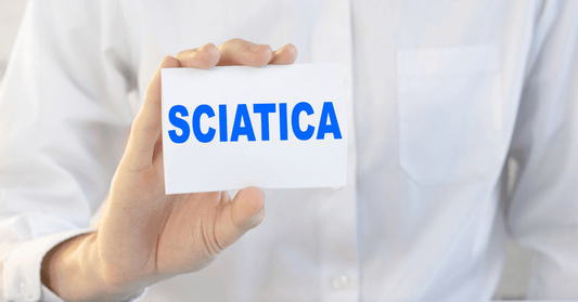 Person holding a sign with 'Sciatica' written on it, symbolizing awareness of sciatica pain across different ages.